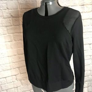 Modern long sleeve with mesh cutouts